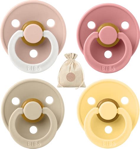 Collage van verschillende Bibs fopspenen in diverse kleuren en stijlen