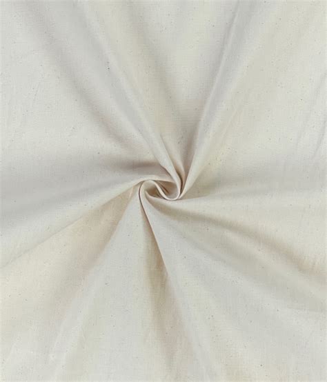 Detailfoto van de stof van het kussen, met nadruk op de textuur van ongebleekt katoen en bamboevezels