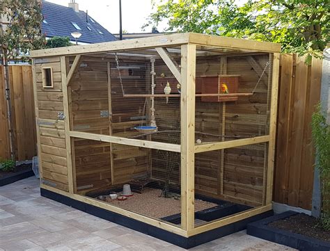 illustratie van een volière met kwartels en beplanting