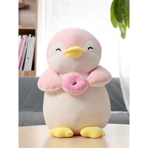 Een schattige pluchen pinguïn met een feestelijk uiterlijk, geschikt als hondenspeelgoed.