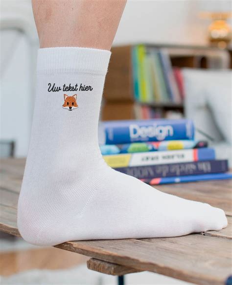 Voorbeeld van gepersonaliseerde sokken met de tekst