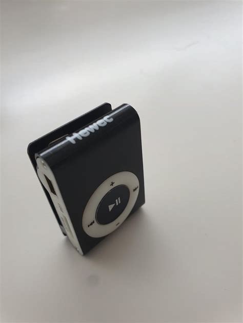 Hewec MP3 speler met clip voor bevestiging aan kleding