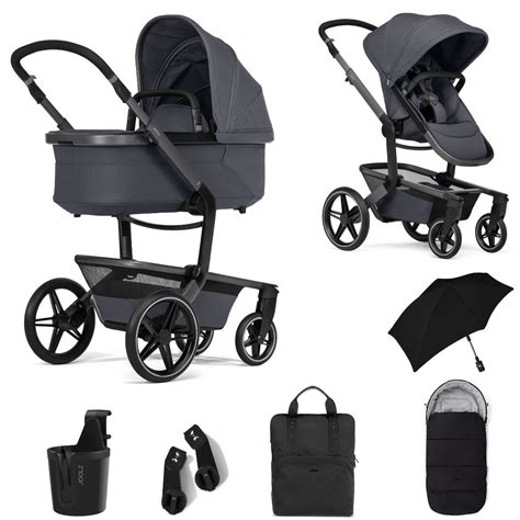 Schematische weergave van de Joolz Day5 kinderwagen met de reiswieg en zitje.