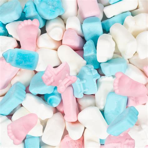 Een selectie van allergenenvrije blauwe geboortesnoepjes in verschillende babyvormen.