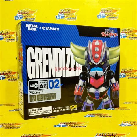 Een doos met Atlantic Grendizer actiefiguren.