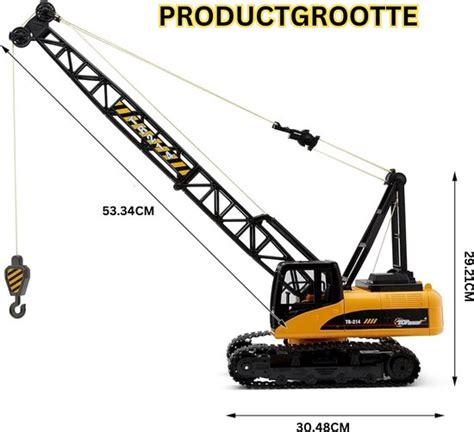 Close-up van de verpakking van de metalen hijskraan miniatuur, met de afmetingen aangegeven.