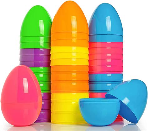 Afbeelding van verschillende Barbie en Dino surprise eieren, met nadruk op kleurverandering en uitbroedingsconcept.