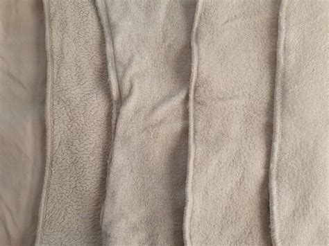 Illustratie die de absorptiecapaciteit van verschillende materialen vergelijkt (katoen, bamboe, microvezel)