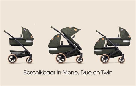 Illustratie van Joolz autostoeladapters die op een Joolz kinderwagenframe worden bevestigd