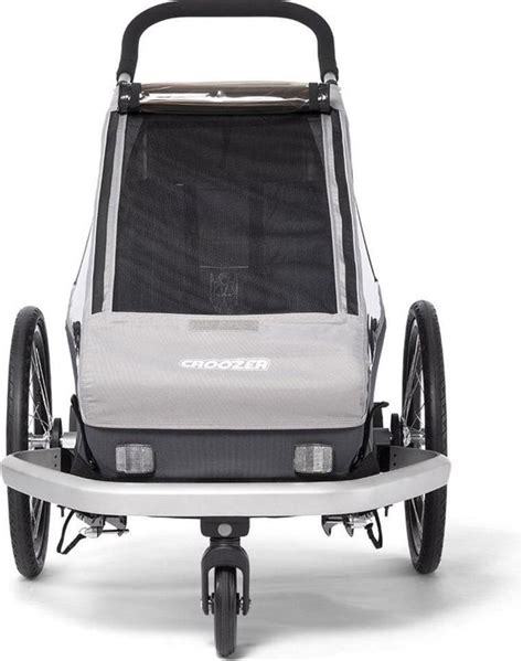 Infographic die de 3-in-1 functionaliteit van de XLC fietskar demonstreert (fietsaanhanger, jogger, kinderwagen).