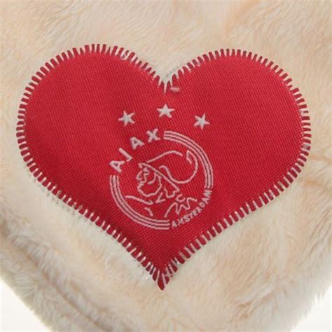 Ajax knuffeldoekje in de vorm van een beertje, zacht en geschikt voor jonge fans.