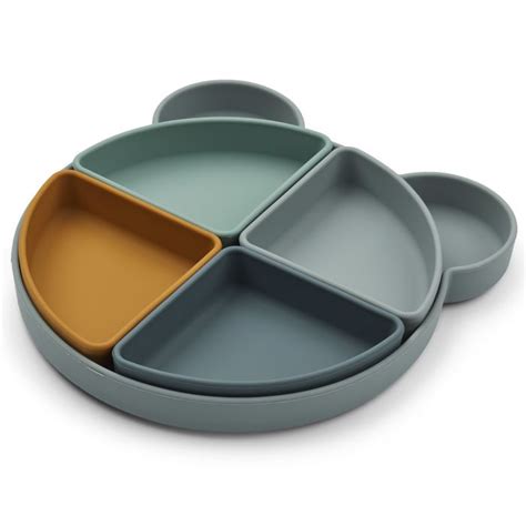 Illustratie van een vakjesbord met verschillende kleine porties voedsel.