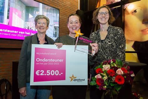 Foto van Irma Bax en haar collega's van Aiber