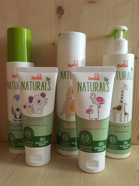 Collage van verschillende Zwitsal Naturals producten met dierlijke illustraties op de verpakking.