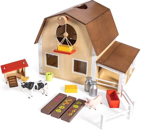 Gedetailleerd houten speelgoed stalontwerp voor een speelgoedboerderij.
