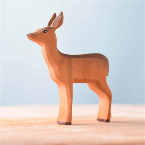Vergelijking van houten dieren van Ostheimer, Holztiger en Bumbu-Toys