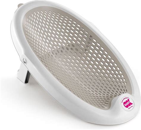 Gedetailleerde foto van het Jelly Junior badzitje in Taupe, met focus op het materiaal en de inklapbare poten