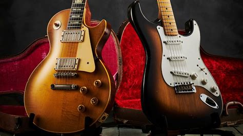 Een afbeelding van de iconische Fender Stratocaster en Gibson Les Paul gitaren.